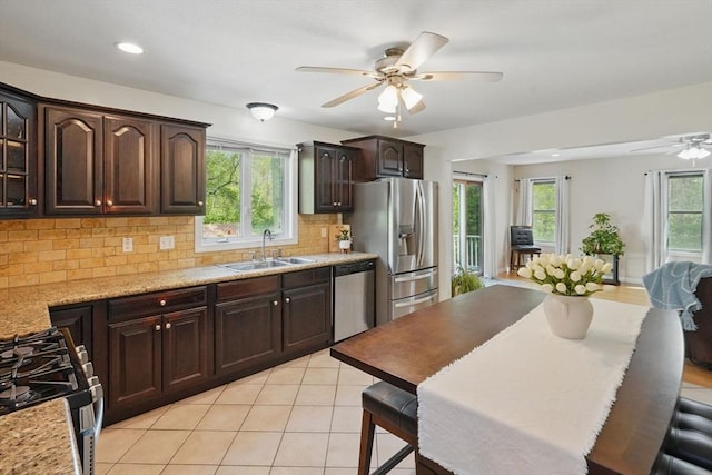 3 Birch Ave, East Longmeadow, MA 01028 - kitchen featuring ceiling fan, appliances with stainless steel finishes, a sink, dark brown cabinets, and tasteful backsplash