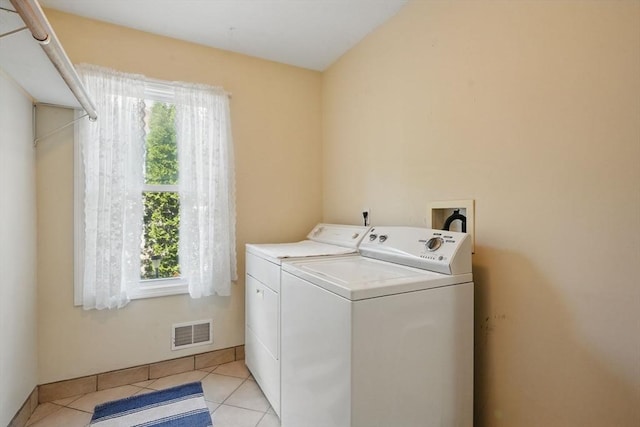 3 Birch Ave, East Longmeadow, MA 01028 - washroom featuring washing machine and dryer, healthy amount of natural light, and light tile patterned flooring