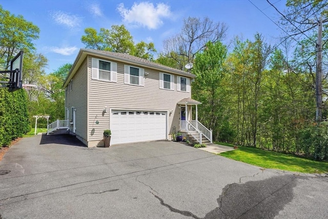 3 Birch Ave, East Longmeadow, MA 01028 - view of front of home with driveway and an attached garage
