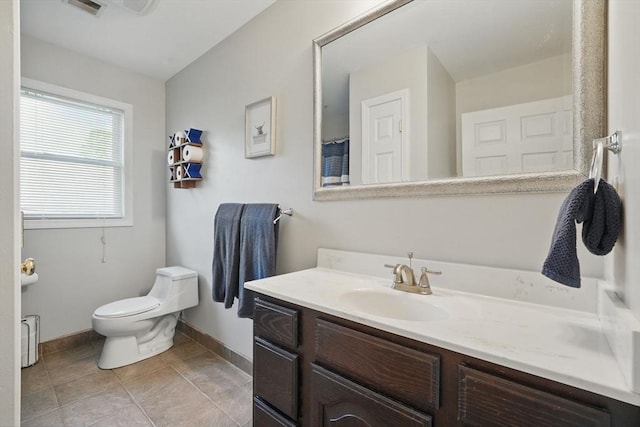 3 Birch Ave, East Longmeadow, MA 01028 - full bath featuring vanity, baseboards, toilet, and tile patterned flooring