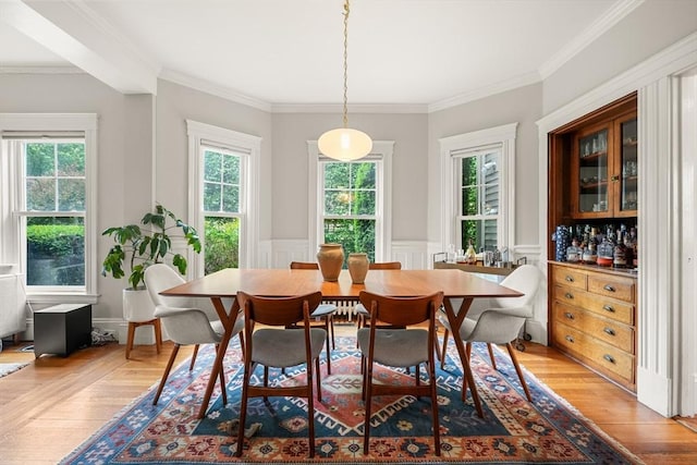 97 Manet Rd, Newton, MA 02467 - dining room with plenty of natural light, ornamental molding, and a wainscoted wall