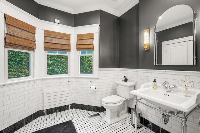 97 Manet Rd, Newton, MA 02467 - bathroom featuring toilet, tile walls, a sink, wainscoting, and crown molding