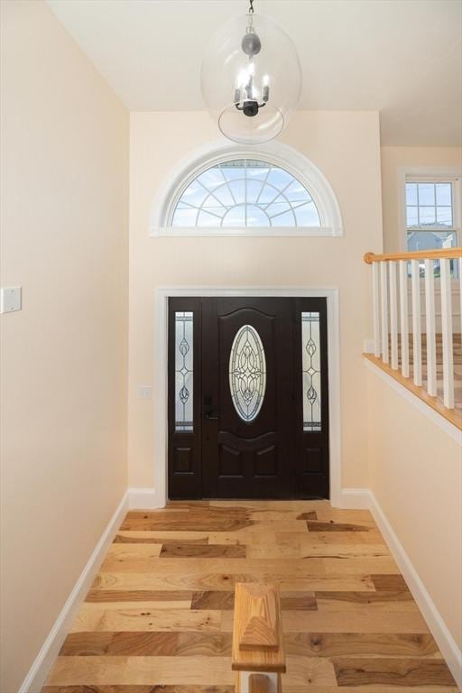 21 Seattle St, Worcester, MA 01604 - foyer entrance with wood finished floors and baseboards