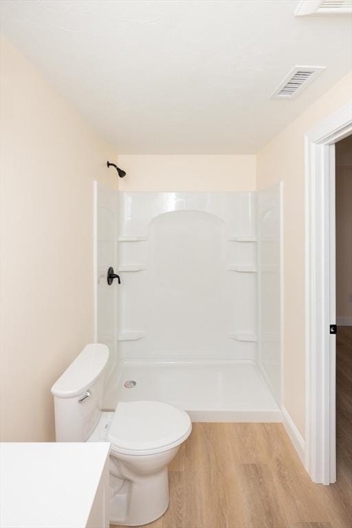 21 Seattle St, Worcester, MA 01604 - full bathroom featuring wood finished floors, vanity, and a shower