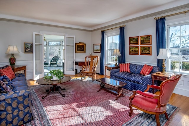 living room with a healthy amount of sunlight and light wood-type flooring