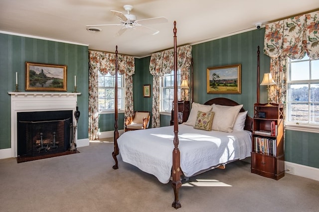 bedroom featuring ceiling fan and carpet floors