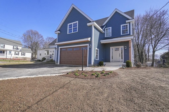 117 Montvale Ave, Woburn, MA 01801 - traditional-style home with driveway and an attached garage