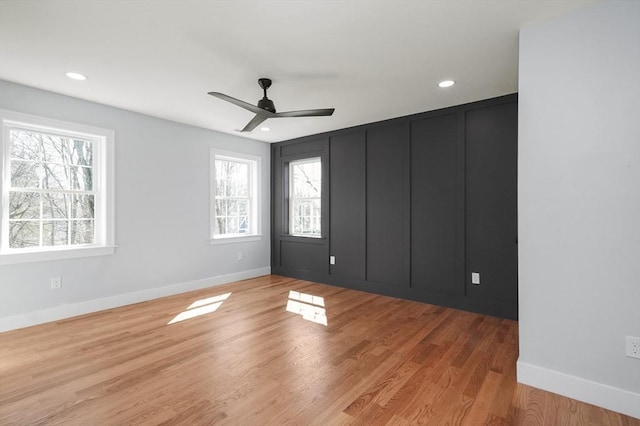117 Montvale Ave, Woburn, MA 01801 - spare room with healthy amount of natural light, baseboards, recessed lighting, and a ceiling fan