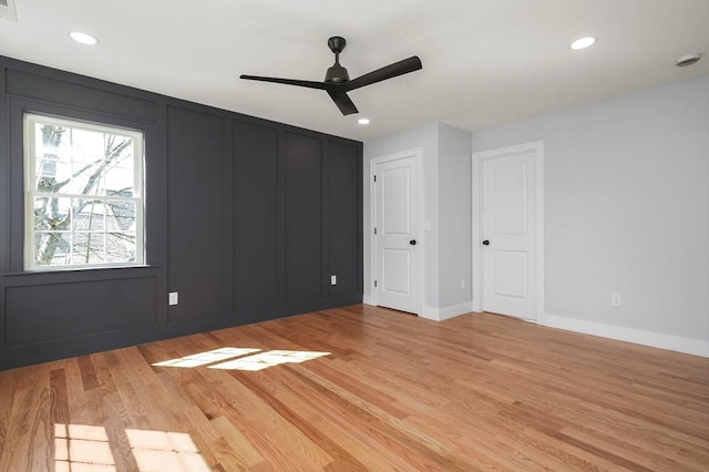 117 Montvale Ave, Woburn, MA 01801 - unfurnished bedroom featuring light wood-style floors, recessed lighting, baseboards, and ceiling fan