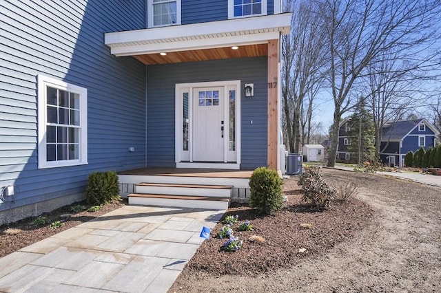 117 Montvale Ave, Woburn, MA 01801 - entrance to property featuring a porch and central air condition unit