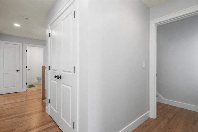 117 Montvale Ave, Woburn, MA 01801 - hallway featuring light wood-style flooring, baseboards, and recessed lighting