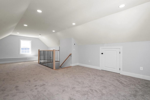 117 Montvale Ave, Woburn, MA 01801 - additional living space with lofted ceiling, carpet, baseboards, and recessed lighting