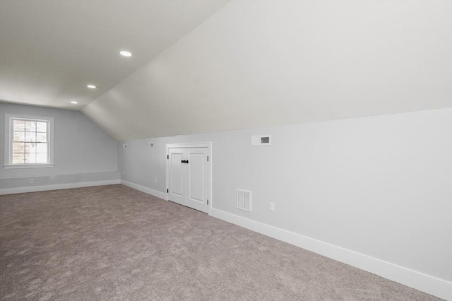 117 Montvale Ave, Woburn, MA 01801 - bonus room with vaulted ceiling, carpet floors, baseboards, and recessed lighting
