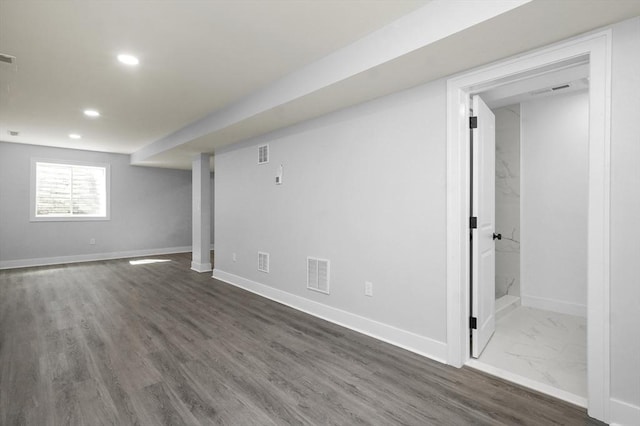 117 Montvale Ave, Woburn, MA 01801 - below grade area featuring recessed lighting, baseboards, and wood finished floors