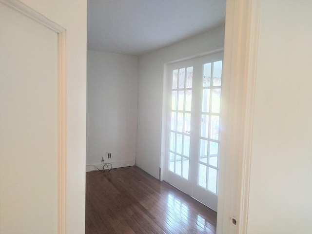 empty room featuring dark wood-style flooring
