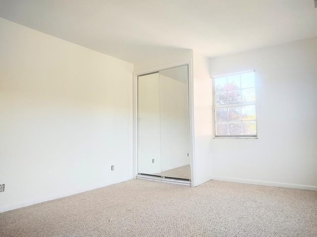 spare room with carpet floors