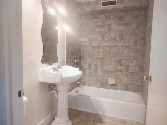 bathroom with shower / bathtub combination