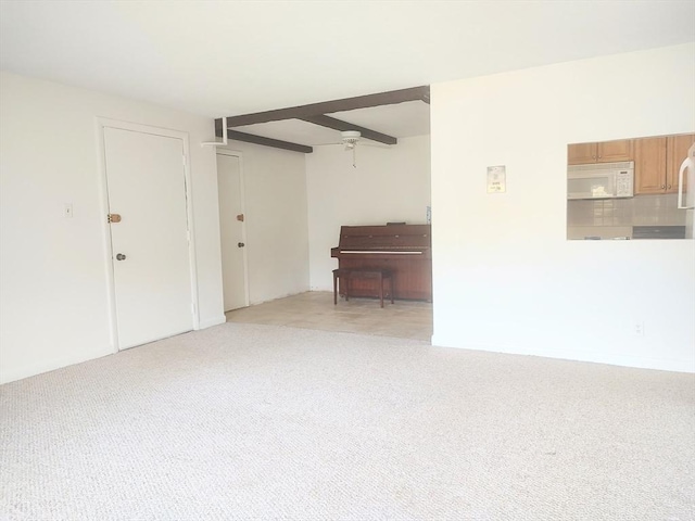 living room with light colored carpet