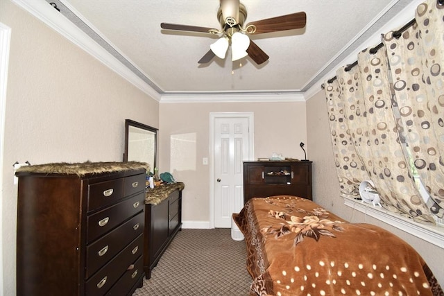 carpeted bedroom with crown molding, ceiling fan, and baseboards