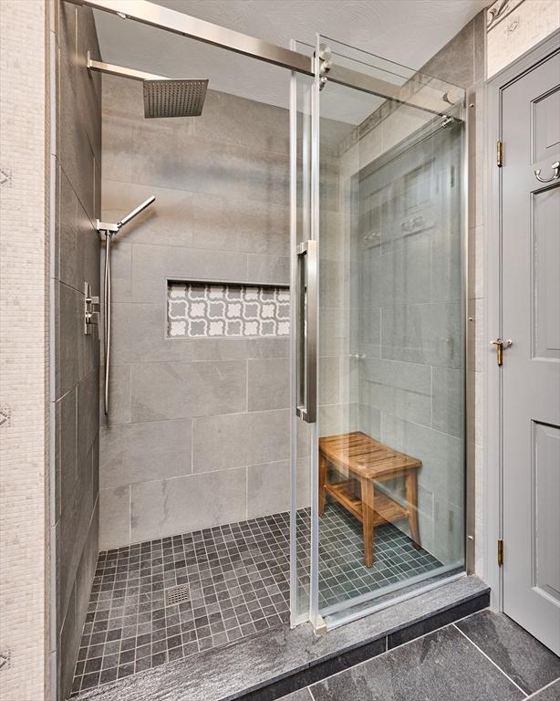 bathroom featuring walk in shower