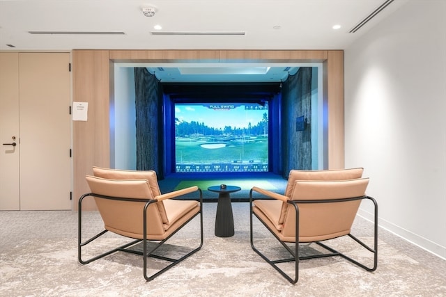 sitting room featuring carpet flooring