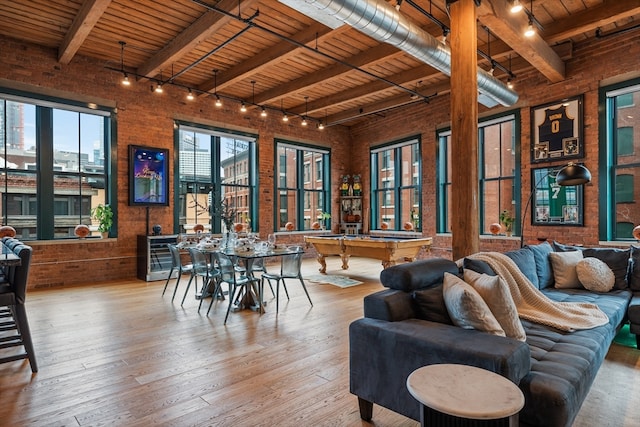 dining room with wood ceiling, beamed ceiling, light hardwood / wood-style floors, and billiards