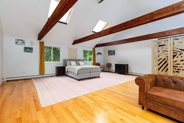 10 Longmeadow Ln, Medway, MA 02053 - living room featuring a skylight, baseboard heating, and wood finished floors