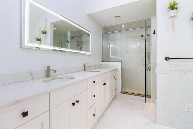10 Longmeadow Ln, Medway, MA 02053 - bathroom with double vanity, a shower stall, and tile walls