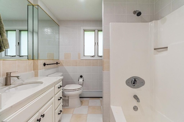 10 Longmeadow Ln, Medway, MA 02053 - bathroom featuring a baseboard radiator, vanity, tile walls, and  shower combination