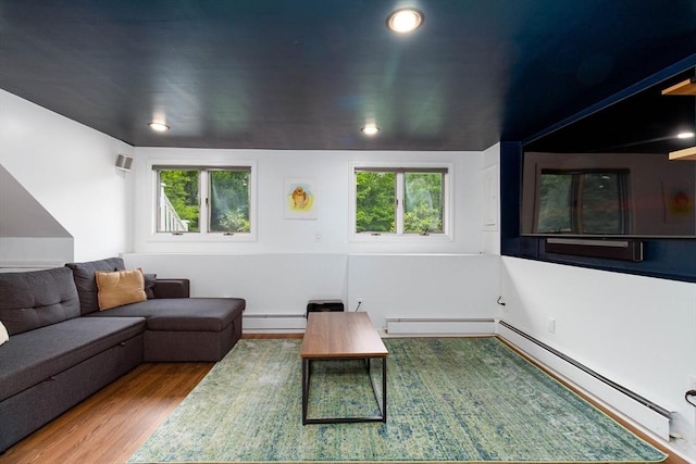 10 Longmeadow Ln, Medway, MA 02053 - living area featuring plenty of natural light, wood finished floors, a baseboard heating unit, and recessed lighting