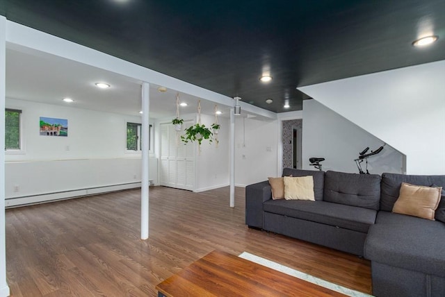 10 Longmeadow Ln, Medway, MA 02053 - living area featuring a baseboard heating unit, wood finished floors, and recessed lighting