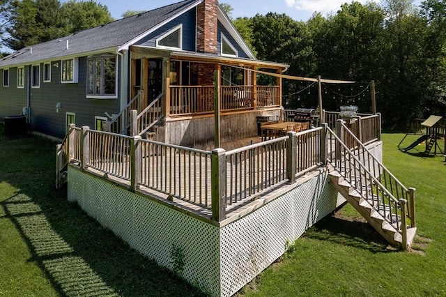 10 Longmeadow Ln, Medway, MA 02053 - rear view of property featuring stairs, a deck, a yard, and a chimney