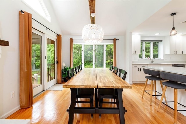 10 Longmeadow Ln, Medway, MA 02053 - dining room with light wood finished floors and a chandelier