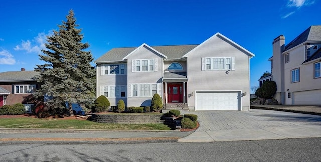 front of property with a garage