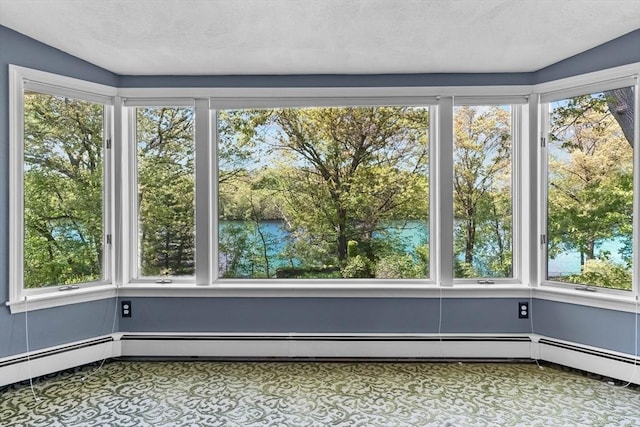 35 Crest Rd, Framingham, MA 01702 - unfurnished sunroom featuring a water view, healthy amount of natural light, and a baseboard heating unit