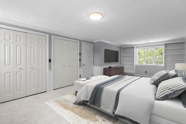 35 Crest Rd, Framingham, MA 01702 - carpeted bedroom with two closets and crown molding