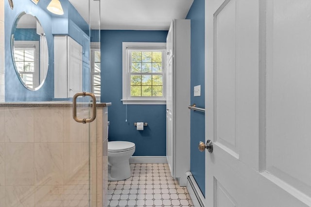 35 Crest Rd, Framingham, MA 01702 - bathroom with baseboards, toilet, a shower stall, and a baseboard radiator