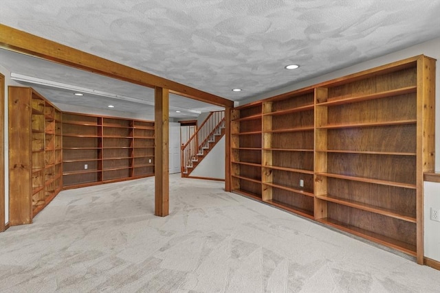 35 Crest Rd, Framingham, MA 01702 - finished basement featuring stairway, recessed lighting, carpet flooring, a textured ceiling, and baseboards