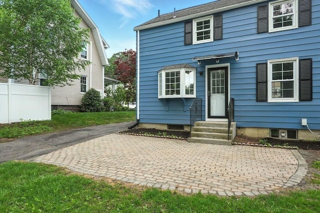 132 Nelson St, West Springfield, MA 01089 - rear view of house with entry steps and a patio area