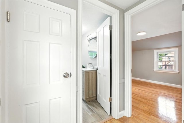 132 Nelson St, West Springfield, MA 01089 - hall with light wood-style flooring and baseboards