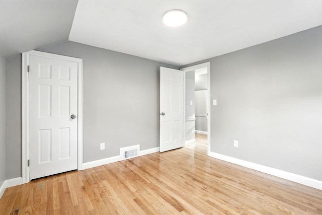 132 Nelson St, West Springfield, MA 01089 - unfurnished bedroom with light wood-style floors and vaulted ceiling