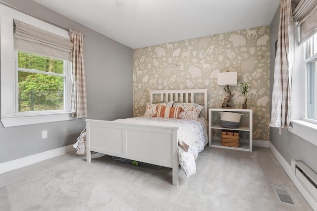 649 Robin Hill St, Marlborough, MA 01752 - bedroom featuring wallpapered walls, a baseboard heating unit, multiple windows, and carpet flooring
