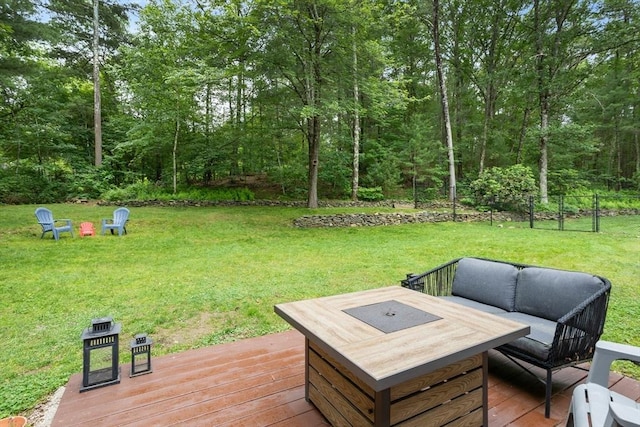 649 Robin Hill St, Marlborough, MA 01752 - wooden deck featuring a yard, an outdoor fire pit, and a wooded view