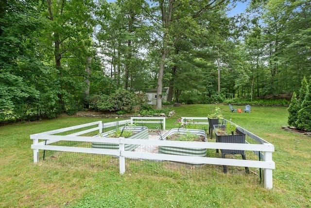 649 Robin Hill St, Marlborough, MA 01752 - view of grassy yard with a vegetable garden