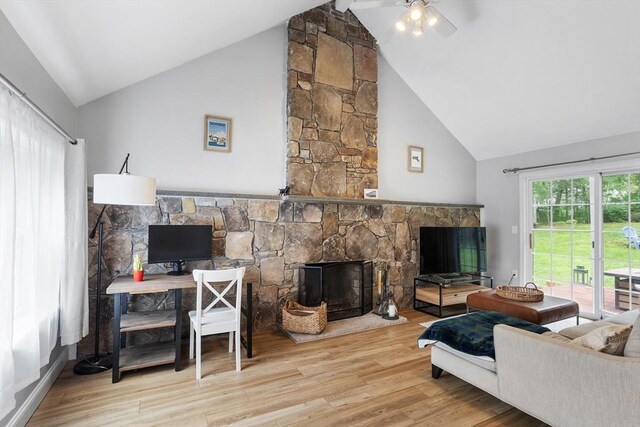 649 Robin Hill St, Marlborough, MA 01752 - living area featuring high vaulted ceiling, ceiling fan, wood finished floors, and a stone fireplace