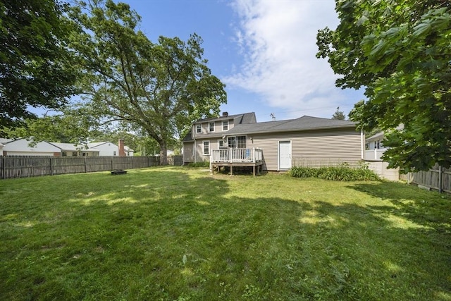 150 Church Ave, Warwick, RI 02889 - rear view of house featuring a fenced backyard and a deck
