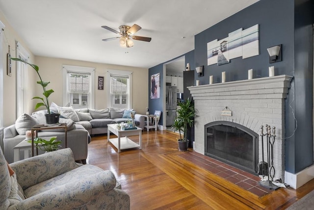 150 Church Ave, Warwick, RI 02889 - living area with a ceiling fan, wood finished floors, and a fireplace