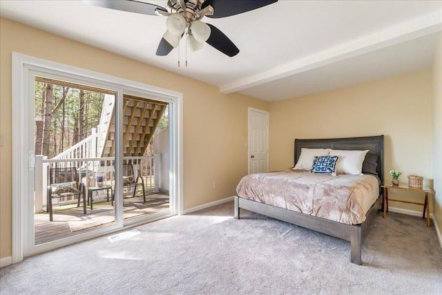 carpeted bedroom with ceiling fan, baseboards, beam ceiling, and access to exterior