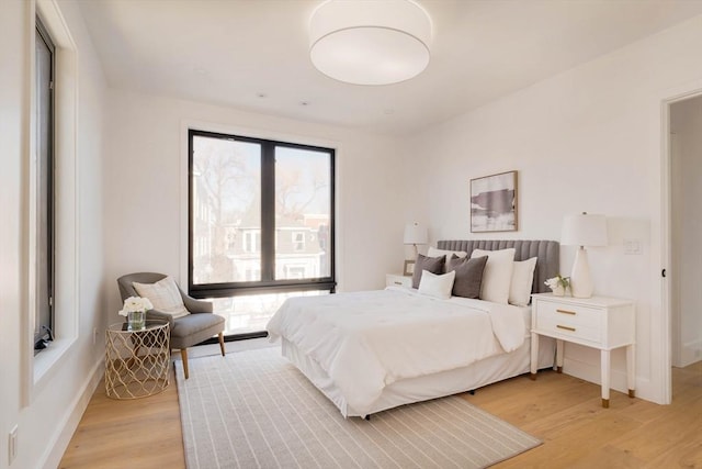 bedroom featuring light hardwood / wood-style floors