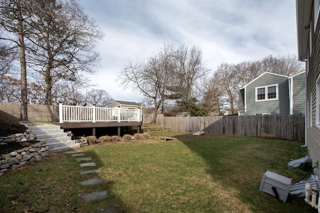 view of yard with a wooden deck